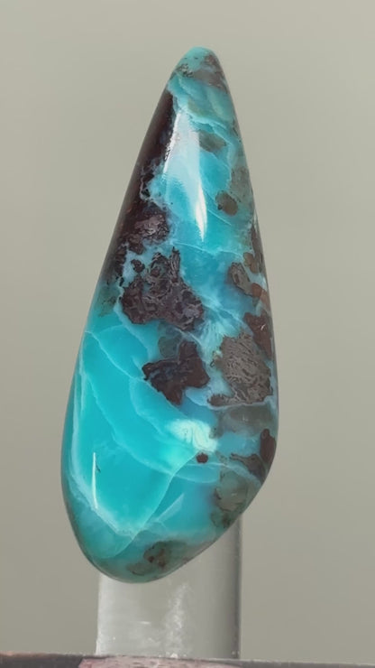 Gem silica and cuprite cabochon